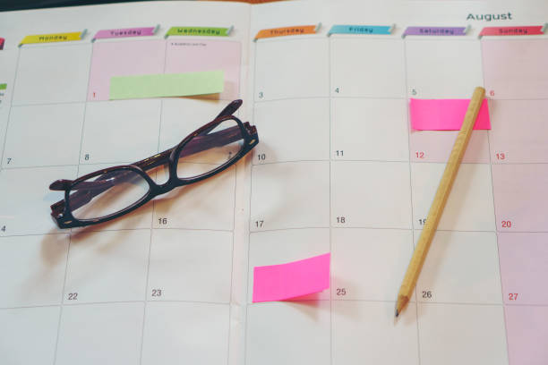 istock Diary,Calendar and agenda for Planner to plan timetable,appointment,organization,management on table.Desktop Calender 2024,laptop and cup of coffee place on wooden office desk.Calendar Concept 2157398090
