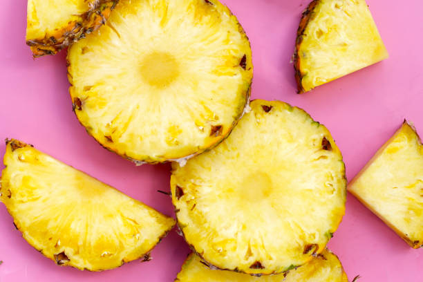 istock Ripe pineapple slices, Fresh fruit 2157400134