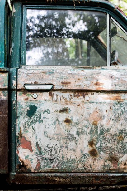istock Side view of an old olive-green car. 2157402773