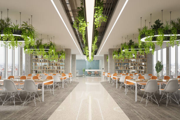 istock Eco-Friendly Library Interior With Bookshelves, Tables, Chairs, Pendant Lights And Creeper Plants 2157403480