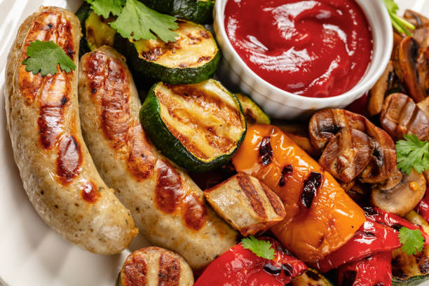 istock grilled white sausages with veggies and mushrooms 2157403663