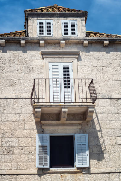 Beautiful facade of an old stone house on the promenade in Orebic, Croatia