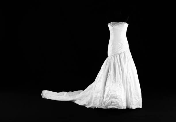 istock white wedding dress isolated on black background 2157411830
