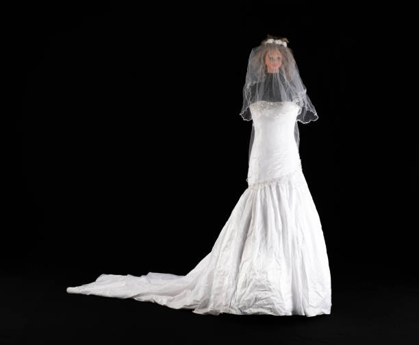 istock white wedding dress isolated on black background 2157411962