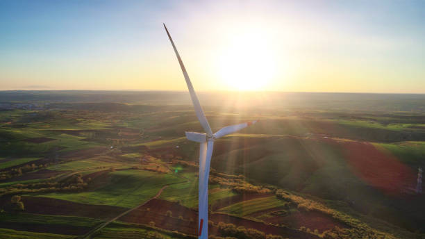 istock Wind Turbine in Sunlit Valley 2157413731
