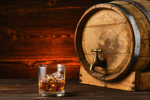 istock Glass of whisky with ice 2157414113