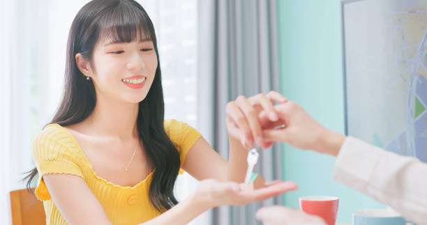 istock woman finish house buying 2157414128