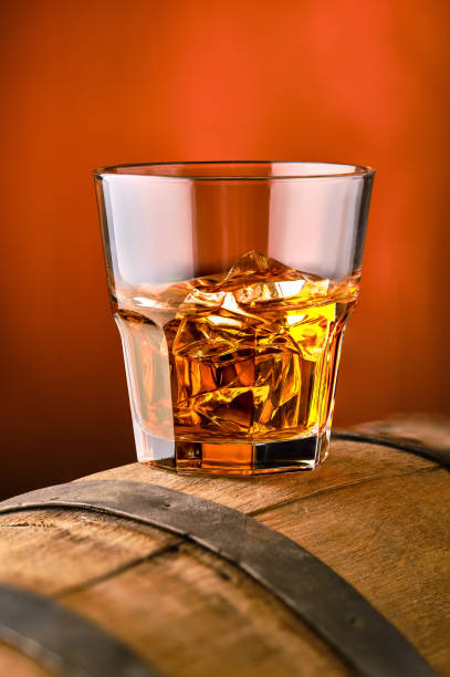 istock whisky with ice on the top of barrel 2157414148