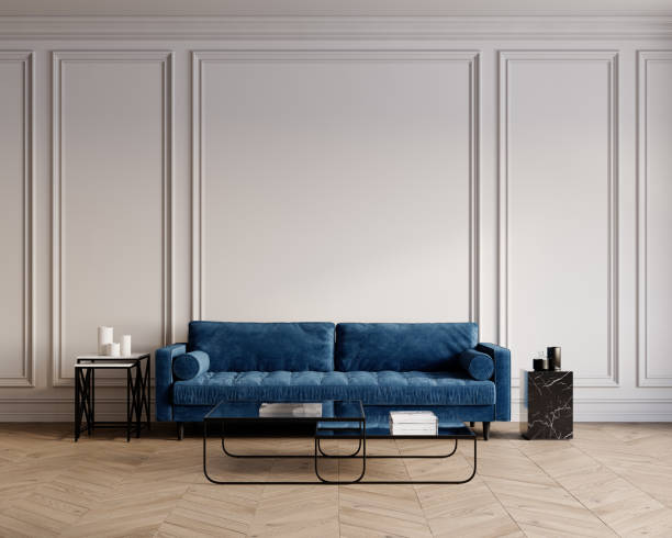 istock White classic interior with blue velour sofa, coffee tables, chevron wood floor and decor. 3d render illustration mockup. 2157415064