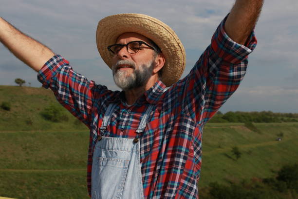 istock Happy mature farmer on bridge 2157417626