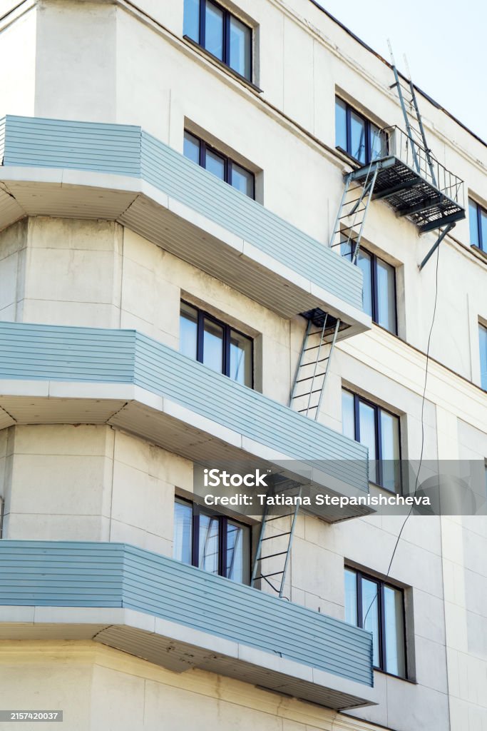 Ladder Rooftop Building A Rooftop Access Ladder Ascends Between Building Balconies Merging ...