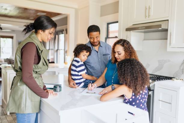 istock Woman signing the purchase agreement 2157421007
