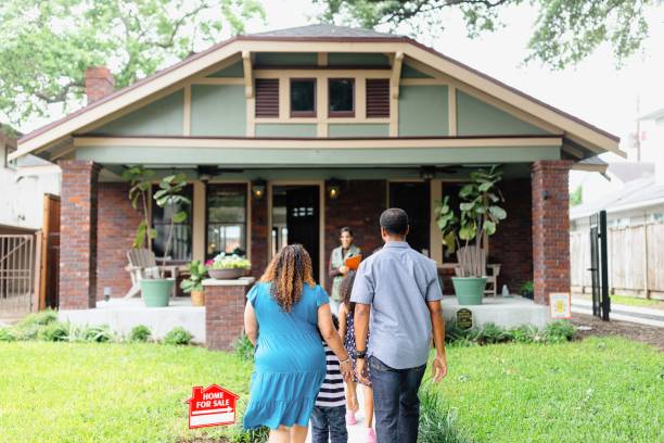 istock Clients meeting with a professional real estate agent 2157421181