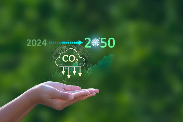 istock The carbon neutral concept reduces CO2 emissions, reducing global warming. Goal of net zero carbon emissions 2050 2157421185