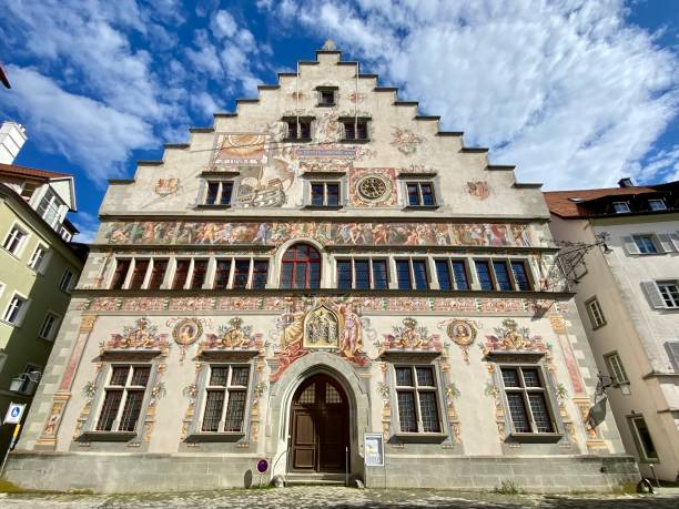 Germany - Lindau - Altes Rathaus ( old city hall ) \n\n\nWe arew  in the old town, in the Bismarckplatz and we see this Altes Rathaus ( old city town ) Gothic gabled building, erected in 1422 and with a façade embellished with a wooden gallery and frescoes\n\n05/19/2024
