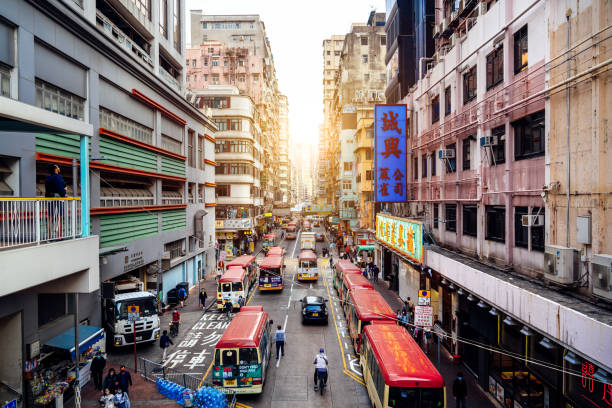 istock Bustling Street Scene in Hong Kong at Sunset 2157421685