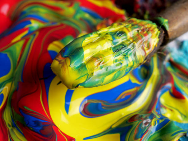 acrylic painted palette background with brush. Palette of colors
