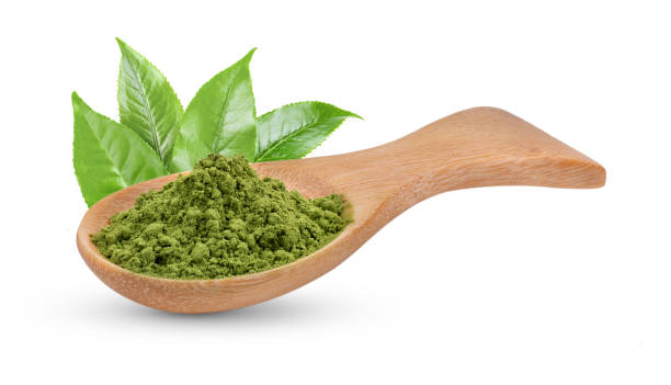 istock matcha green tea powder in wood spoon on white background 2157428503
