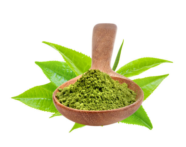 istock matcha green tea powder in wood spoon on white background 2157428551