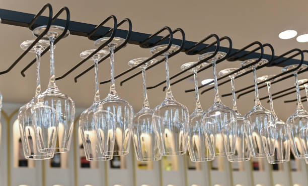 istock different glasses hang above the bar counter. 2157428908