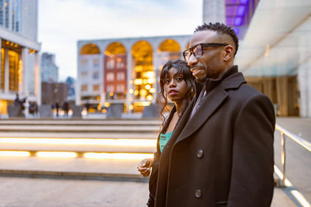 istock Elegant couple in Manhattan at dusk 2157433412