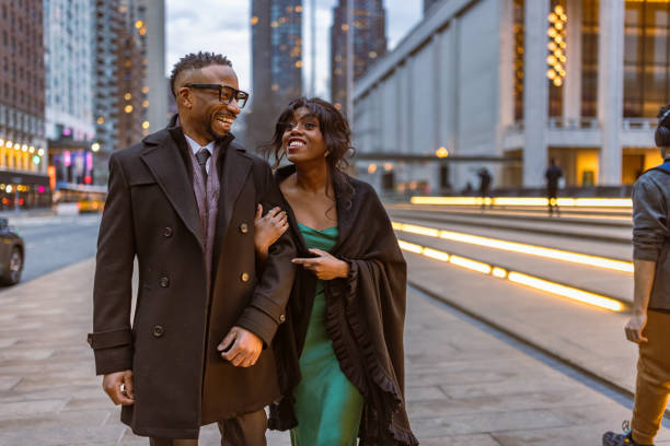 istock Elegantly Dressed Couple Going to Opera in Manhattan at Dusk 2157433416