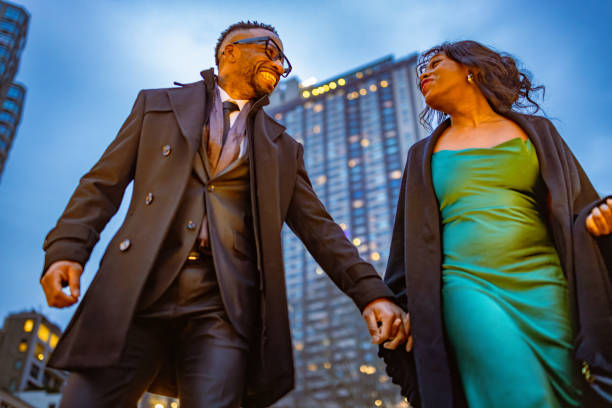 istock Elegantly Dressed Couple at Dusk in Manhattan 2157433433