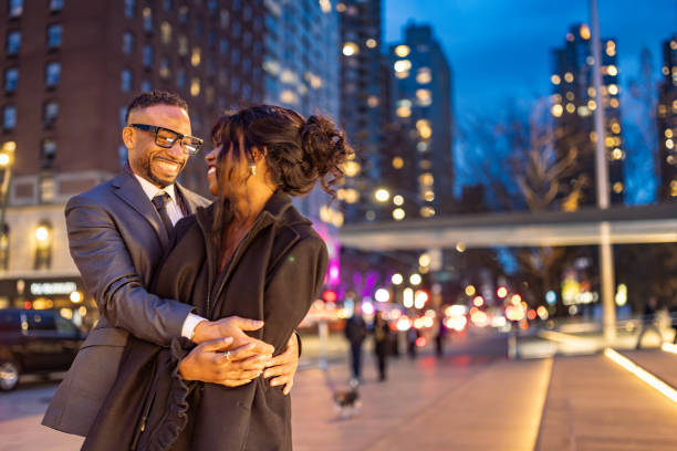 istock Elegantly Dressed Couple in Manhattan at Dusk 2157433444