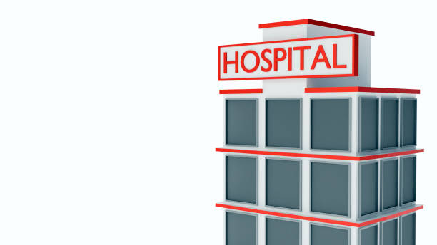 A view down the corridor of the emergency department of the hospital with doorways leading to individual examination rooms and a bathroom at the end of the hall.