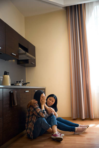istock Crying daughter being consoled by compassionate parent 2157434567