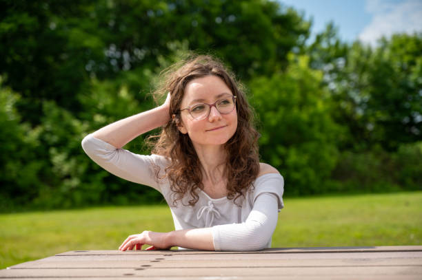 Young adult woman looking at camera