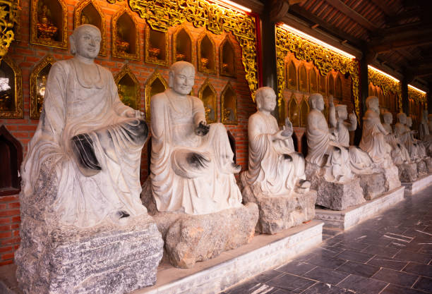 istock Many Buddha statues in a hindu temple in Vietnam 2157440061