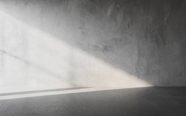 istock Minimalist Abstract Concrete Empty Room for product presentation, Light beam falling from window 2157440958