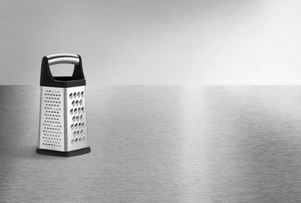 istock Metal food grater on a metal background 2157442099