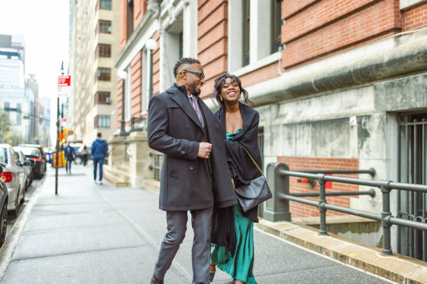 istock Elegant Couple Walking to Theatre in Manhattan Evening 2157445089