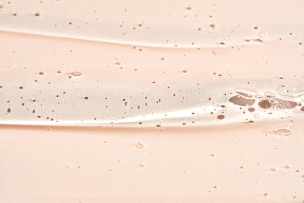 istock Transparent liquid Gel serum texture. Make-up and cosmetics texture beige background, skincare product and beauty cream 2157446965