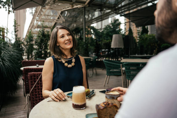 istock Couple eating outside at luxury hotel 2157447450