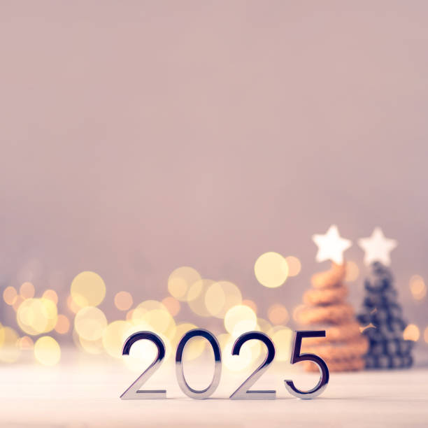istock Metal numbers 2025 on table with bokeh lights. 2157451376
