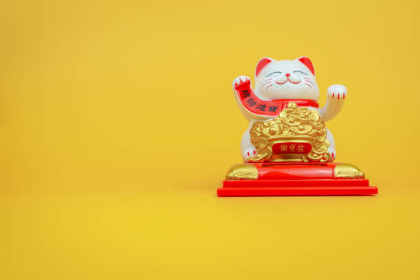 istock White cat figure beckoning, money fetching concept. 2157452696