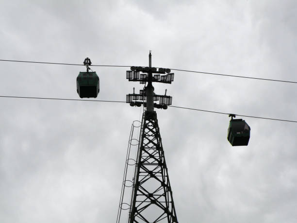 istock Tower and cable car cabins that transport people 2157455413