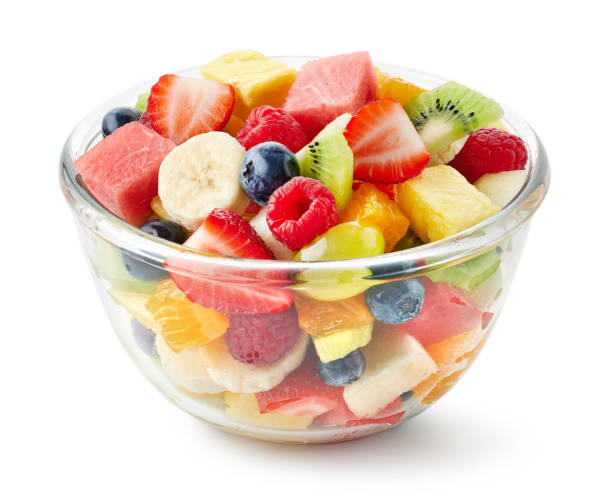istock Bowl of fresh fruit salad on white background 2157455984
