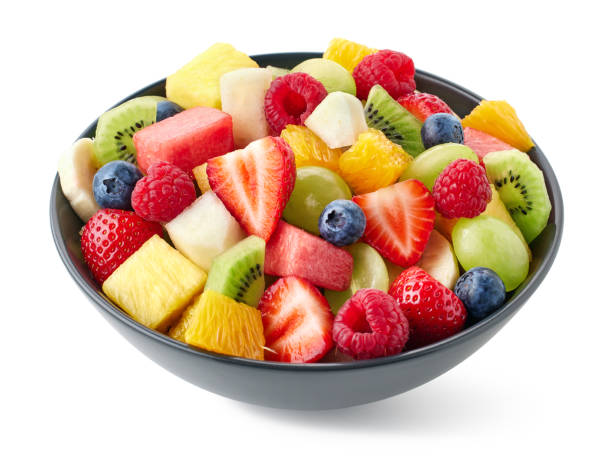istock Bowl of fresh fruit salad on white background 2157455995