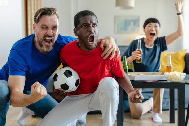 istock Sports fans enthusiastically support their team 2157456143