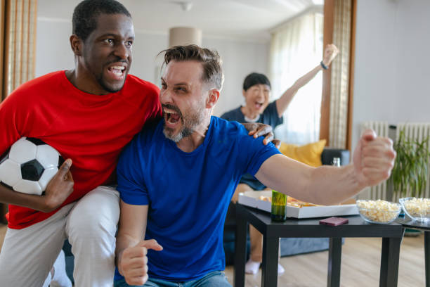 istock Sports fans enthusiastically support their team 2157456170