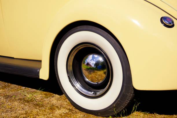 Chrome hub cap on a vintage 1937 Ford Model 78 Deluxe Coupe