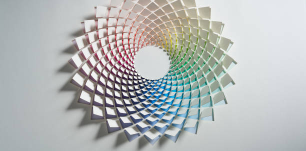 istock Intricate geometric cut-paper artwork with vibrant gradient colors in a circular pattern on white background 2157456522