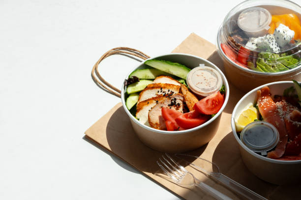 istock Take out poke bowl with craft bag on white background 2157458302