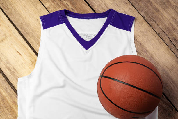 istock Basketball uniform on wooden background top view 2157458305