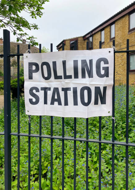 istock Polling station sign on railings 2157460114