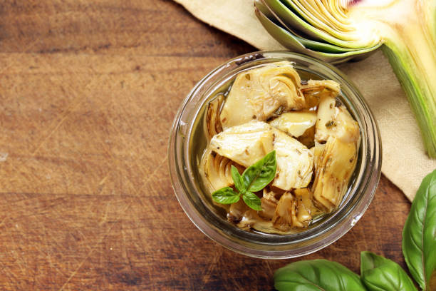 istock marinated artichokes italian appetizer on the table 2157462951